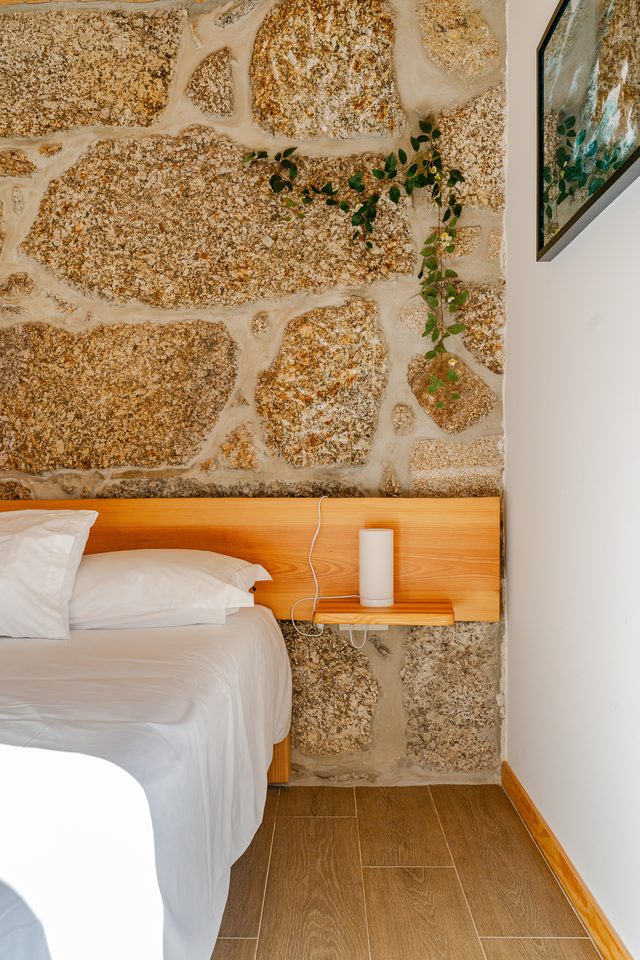 Rustic stone bedroom detail at Casa do Sol villa, Celorico de Basto
