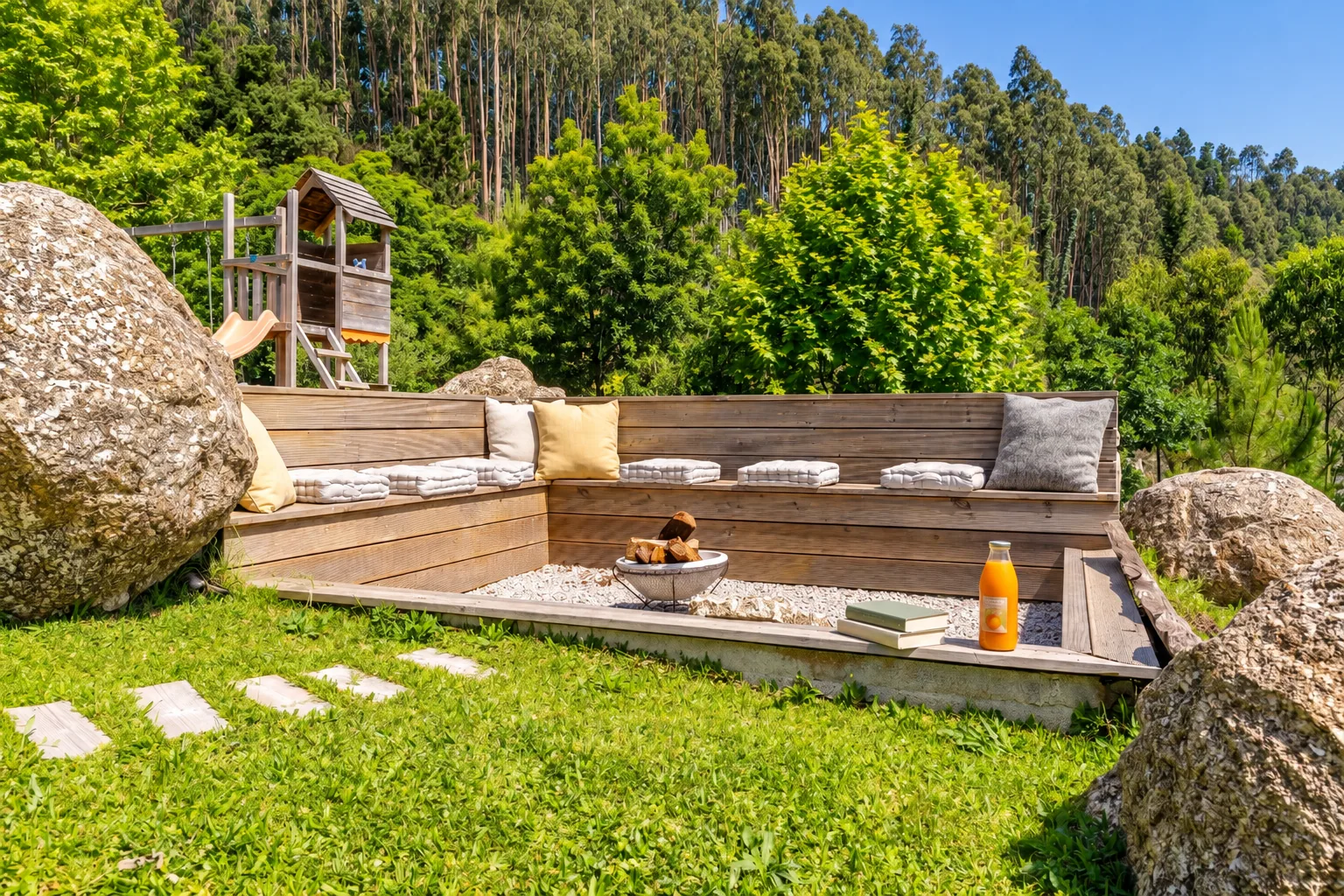 Garden seating area at Casa do Sol with wooden benches